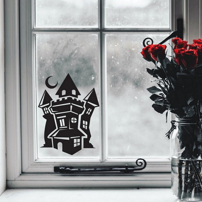 Haunted House Halloween window sticker displayed on a window