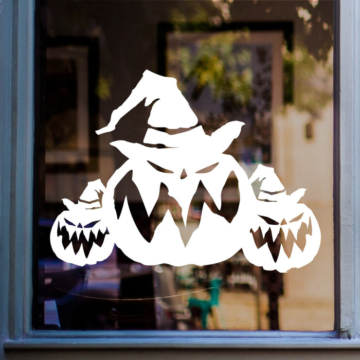 Halloween Pumpkin Window Sticker displayed on a window
