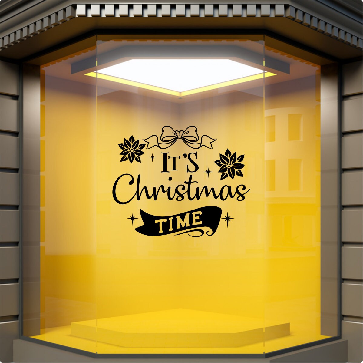 It's Christmas Time festive vinyl decal displayed on a yellow shop window