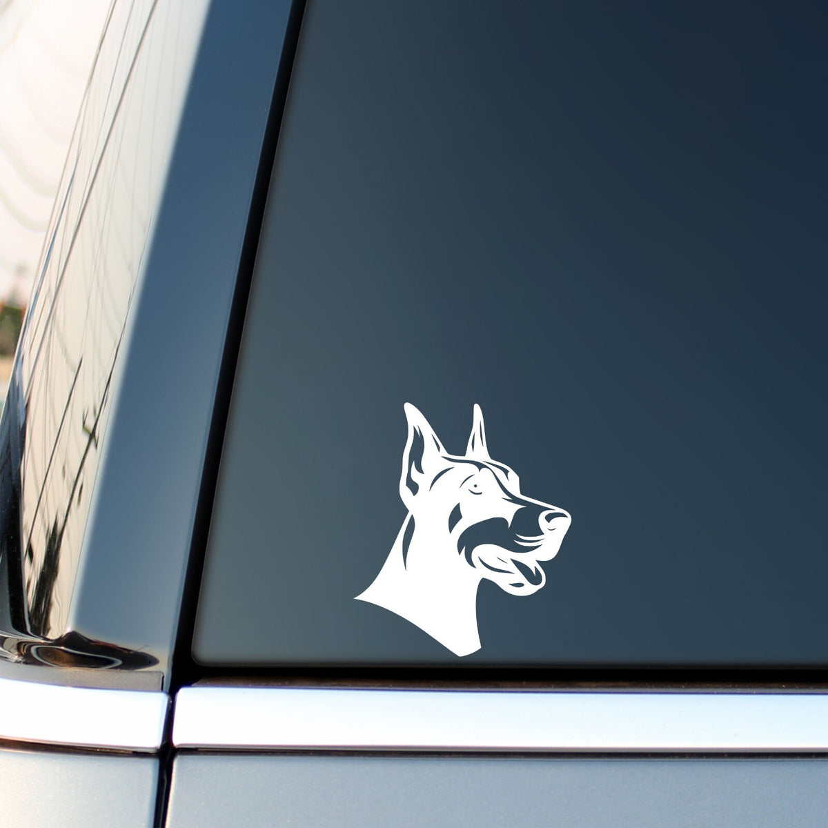 Doberman Head vinyl sticker on a white background.