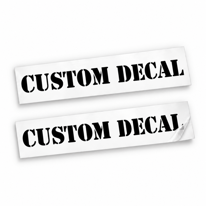 Two matching black Custom Decal vinyl stickers in bold stencil lettering on backing sheets against a white background.