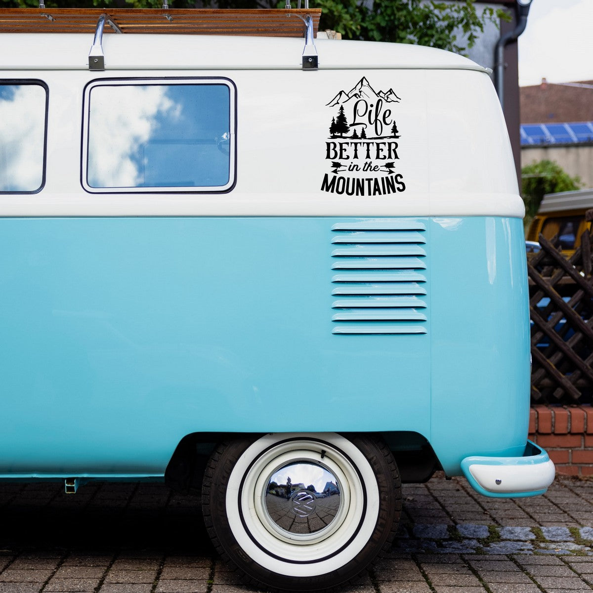 Life Is Better In The Mountains caravan sticker shown on a blue campervan