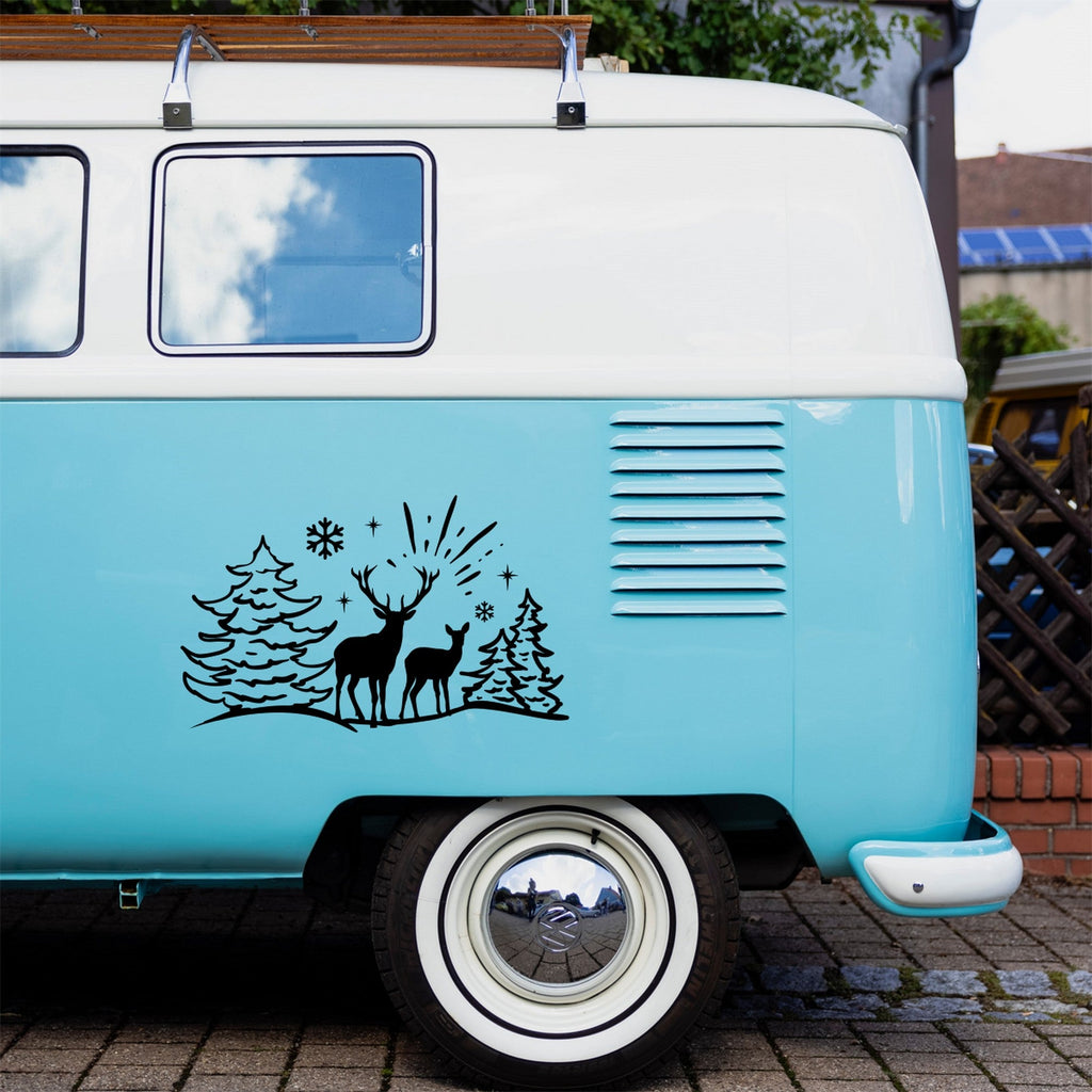 Deer Winter Scene caravan sticker shown on a blue campervan
