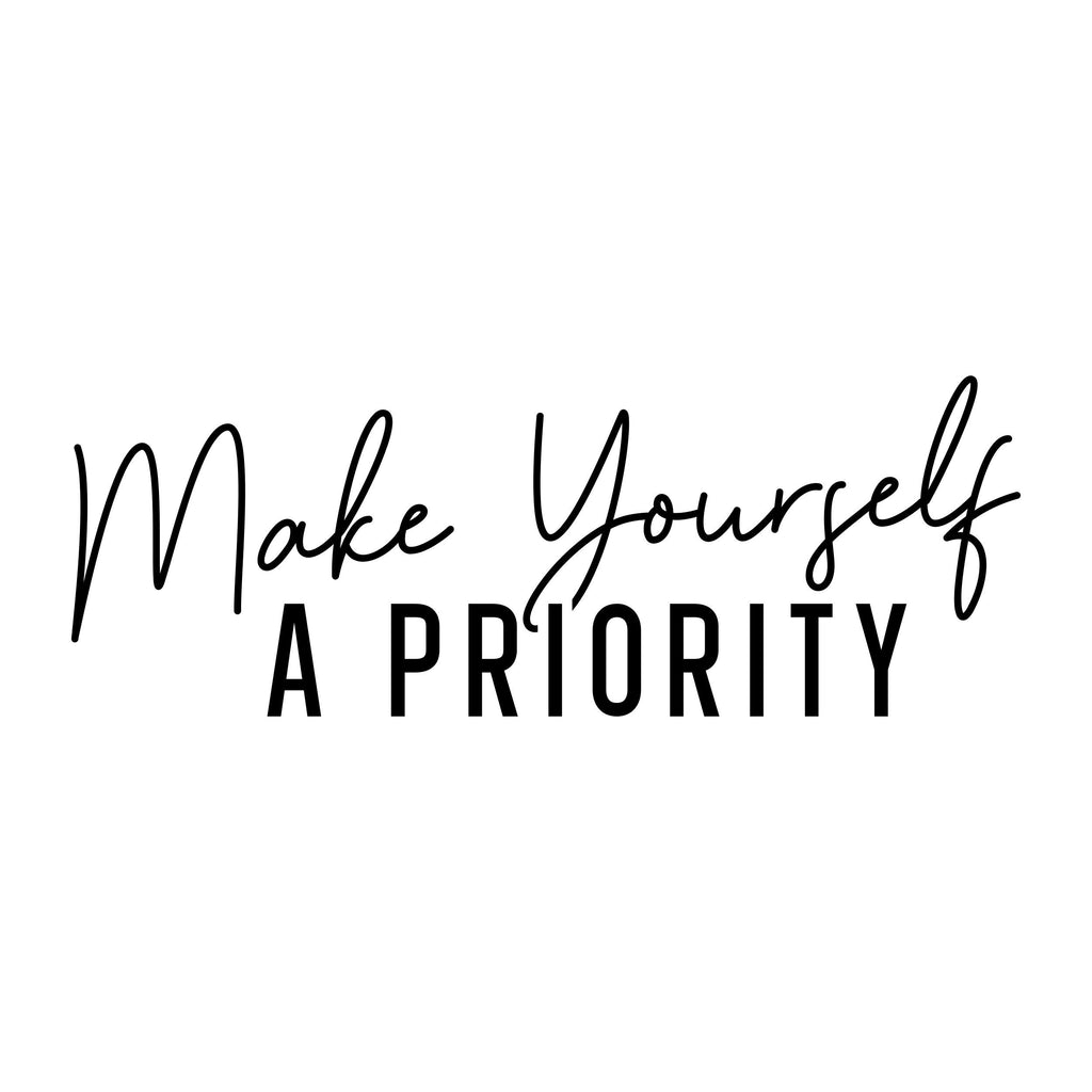 Black “Make Yourself A Priority” mirror sticker design on a white background