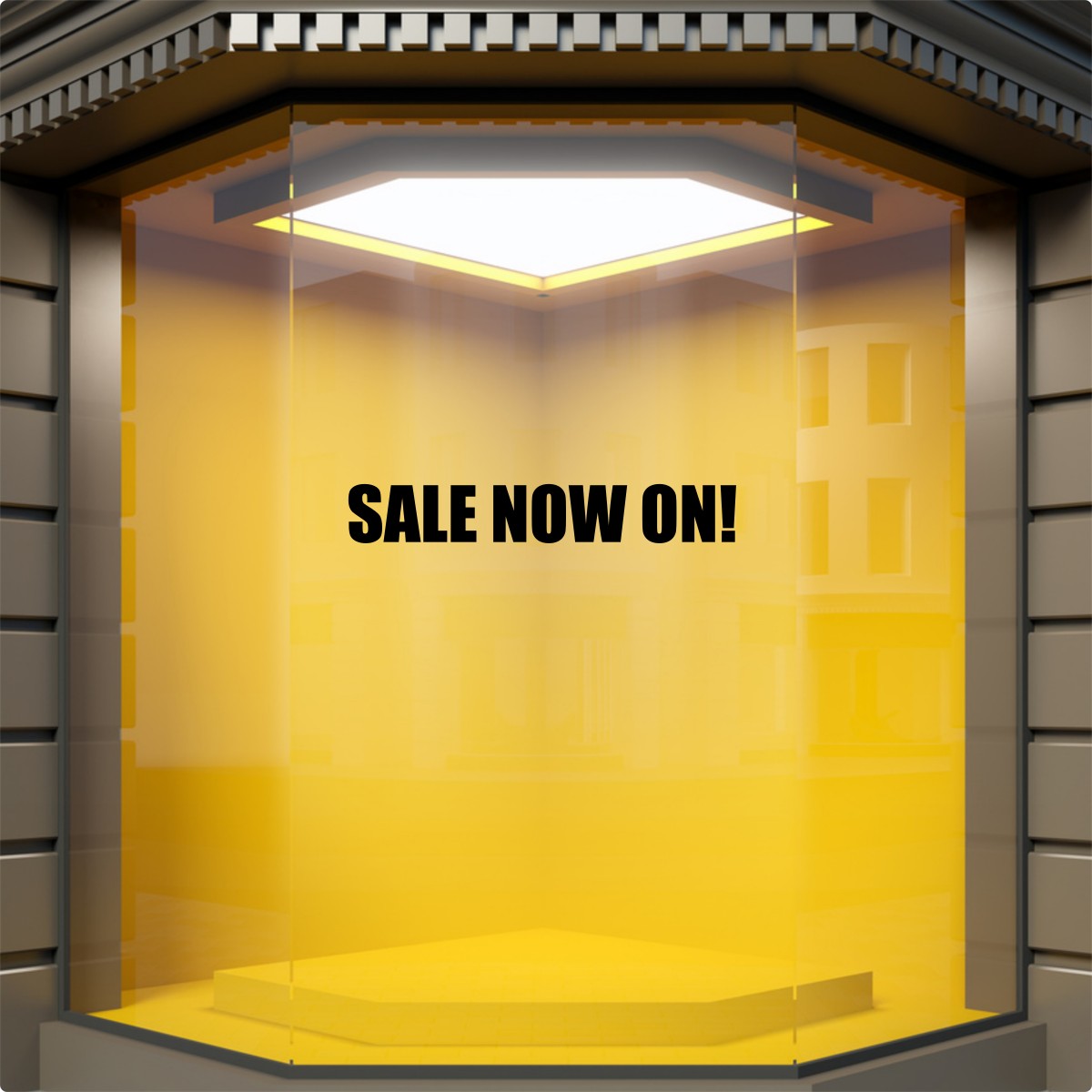 Black Sale Now On vinyl decal displayed on a yellow retail window