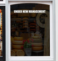 Under New Management Shop Window Sticker display mockup