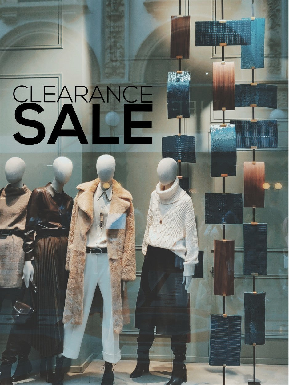 Black Clearance Sale vinyl sticker on a fashion shop window