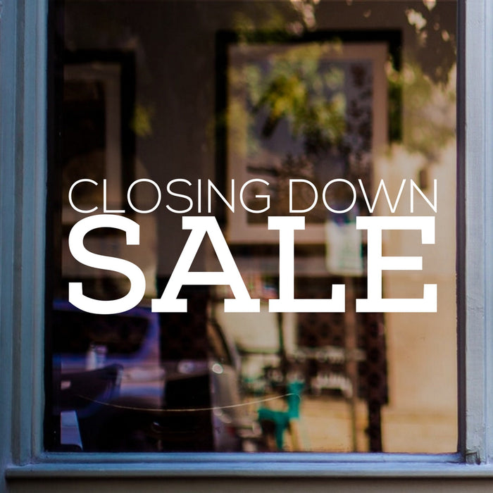Closing Down Sale Shop Window Sticker shown on a shop window