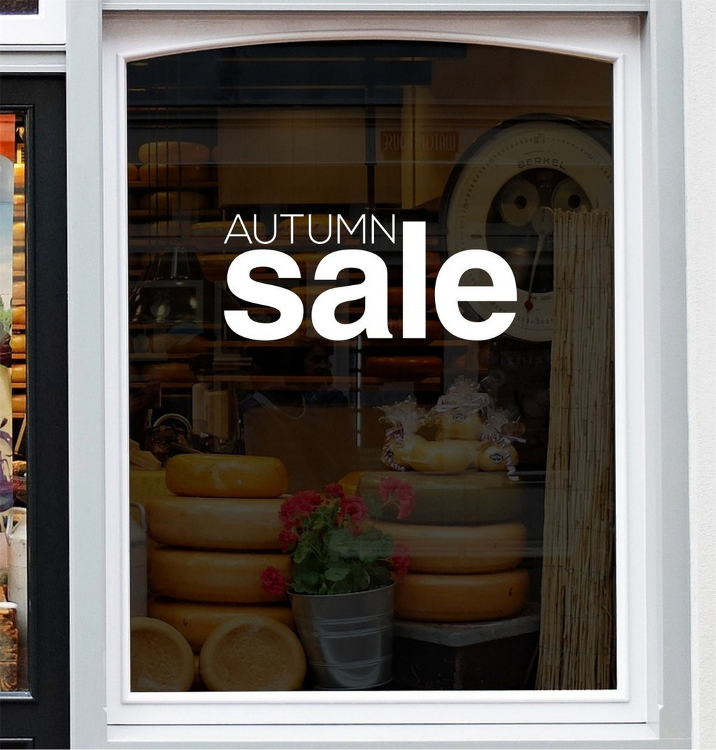 Autumn Sale Shop Window Sticker displayed on a storefront glass pane