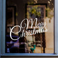 Classic white Merry Christmas vinyl sticker on a fashion shop window