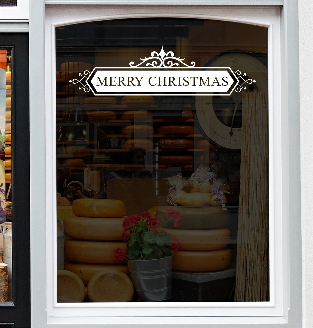 Classic Merry Christmas banner decal shown on a retail window display