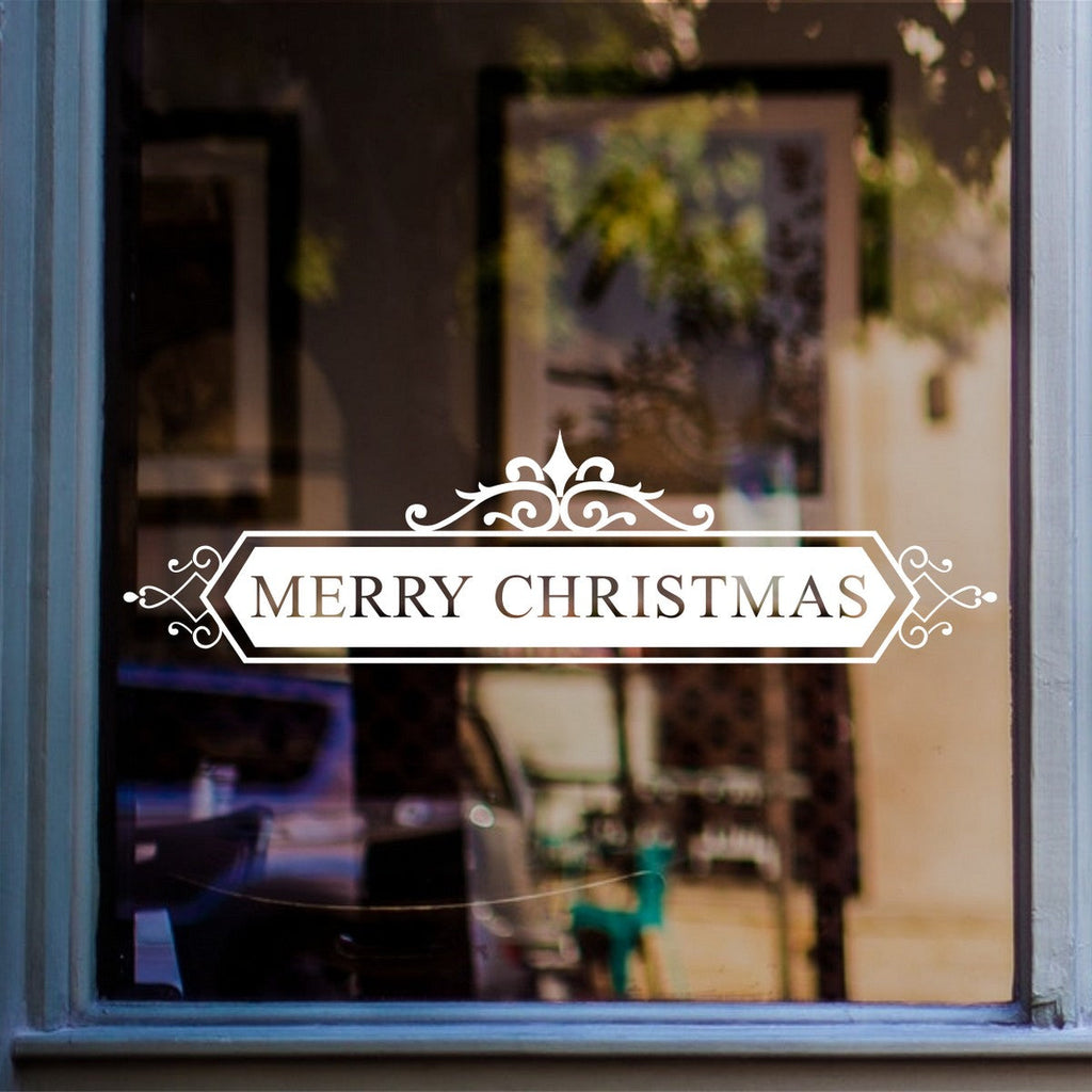 Traditional Merry Christmas banner vinyl decal displayed on a shop window