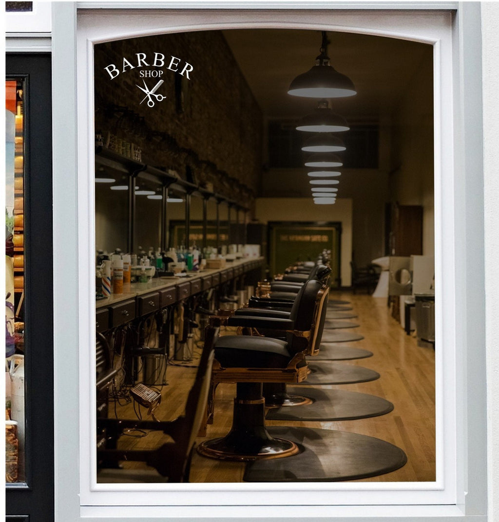 Barber Shop Scissors Window Sticker displayed on a storefront glass pane
