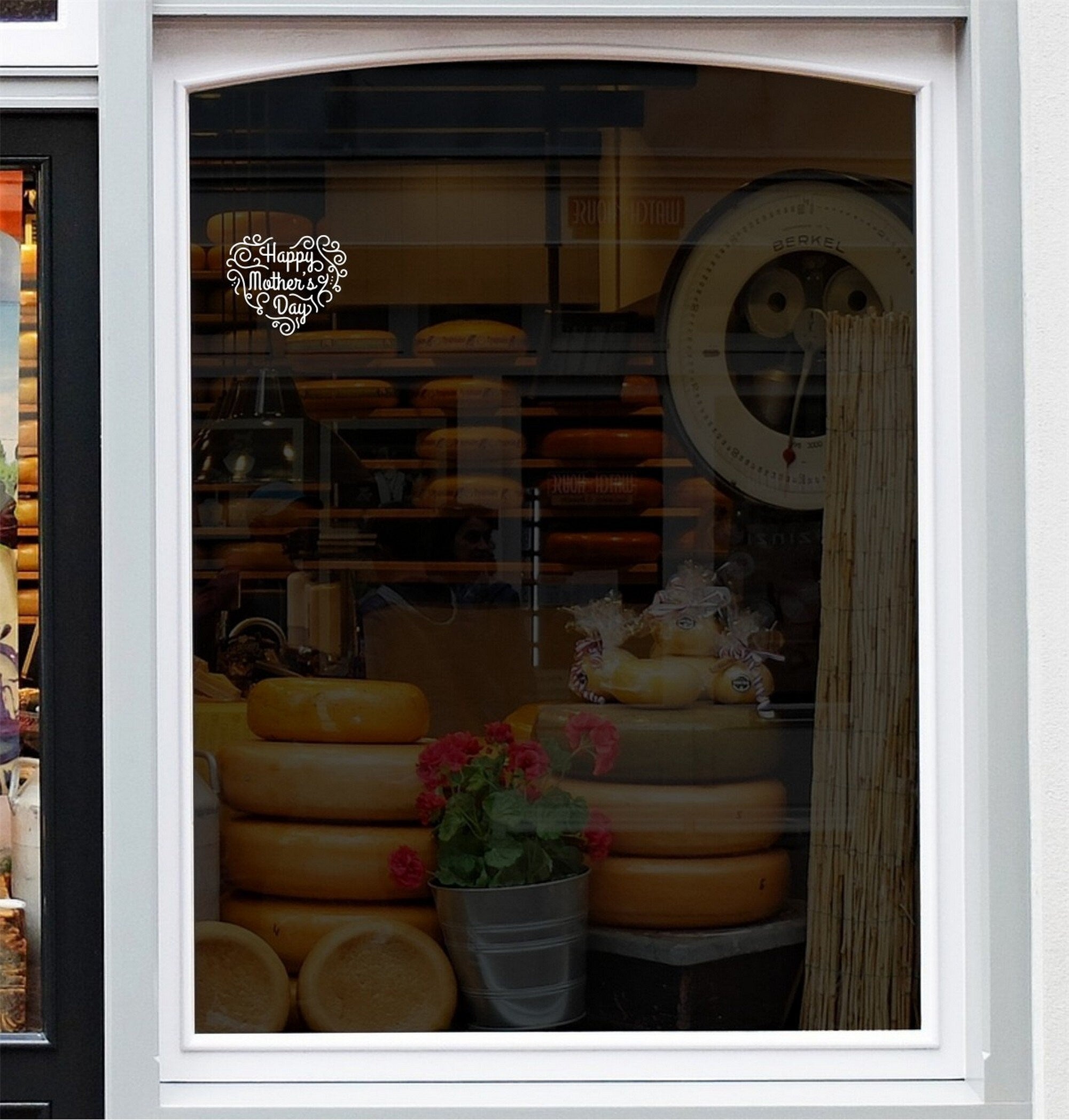 Ornate Happy Mother’s Day Shop Window Sticker shown in an alternative retail window setting