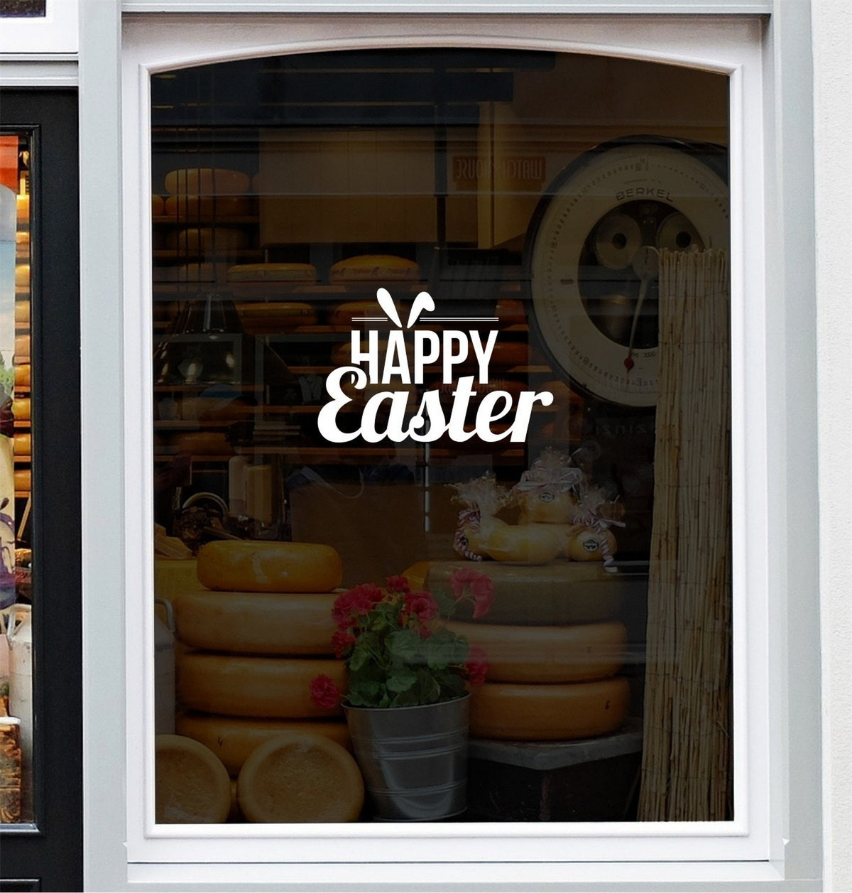 Happy Easter Shop Window Sticker displayed on a storefront glass pane