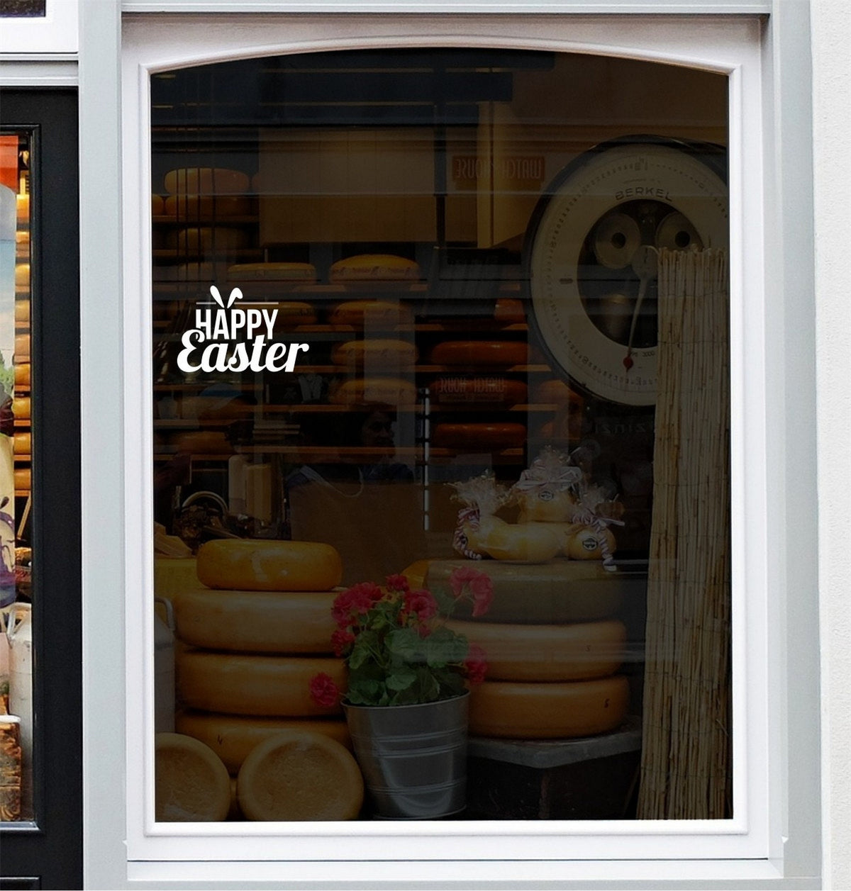 Happy Easter Shop Window Sticker shown in an alternative retail window setting