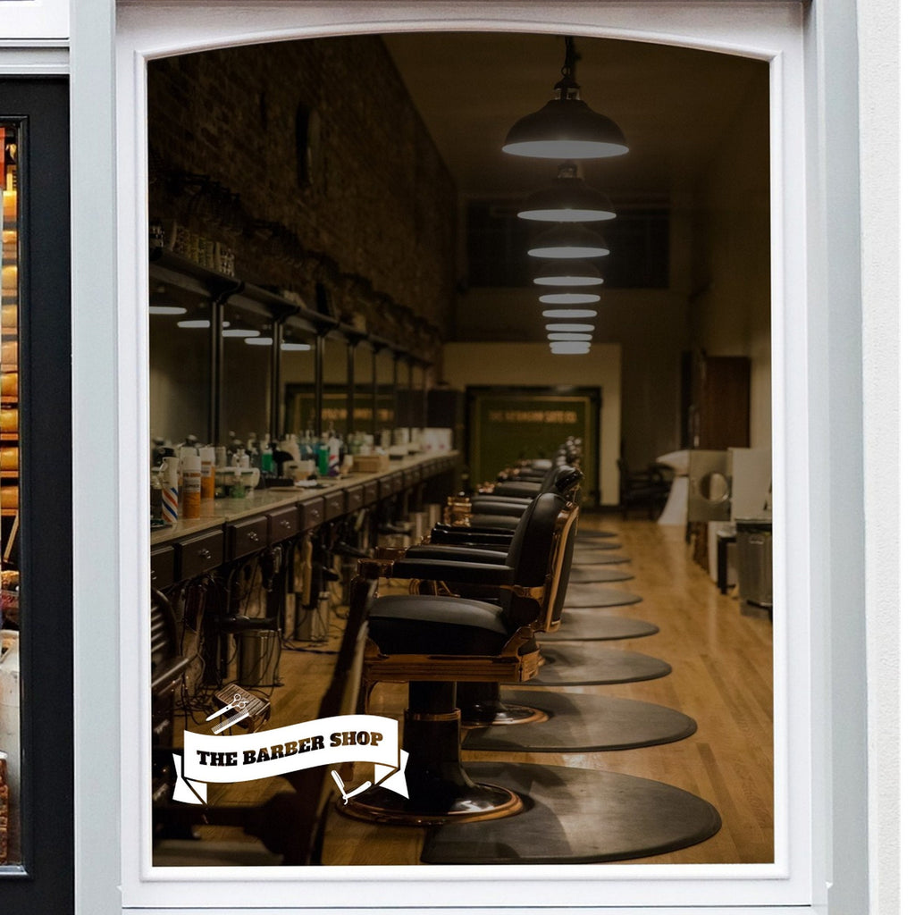The Barber Shop Banner Window Sticker design shown in black on a plain white background