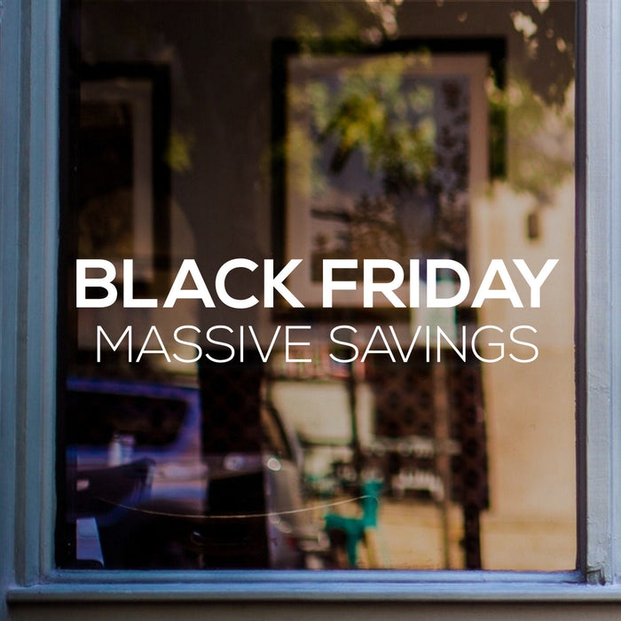 Black Friday Massive Savings sticker on a blue-framed shop window