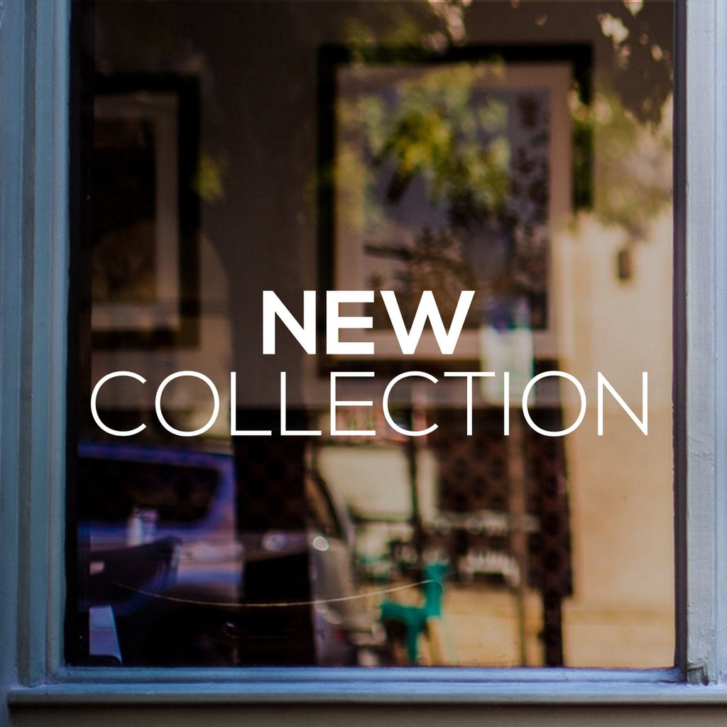 New Collection Shop Window Sticker displayed on a shop window