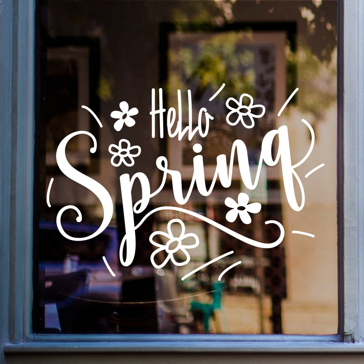 Hello Spring Shop Window Sticker displayed on a shop window