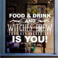 Witches Brew Halloween Window Sticker shown on a shop window