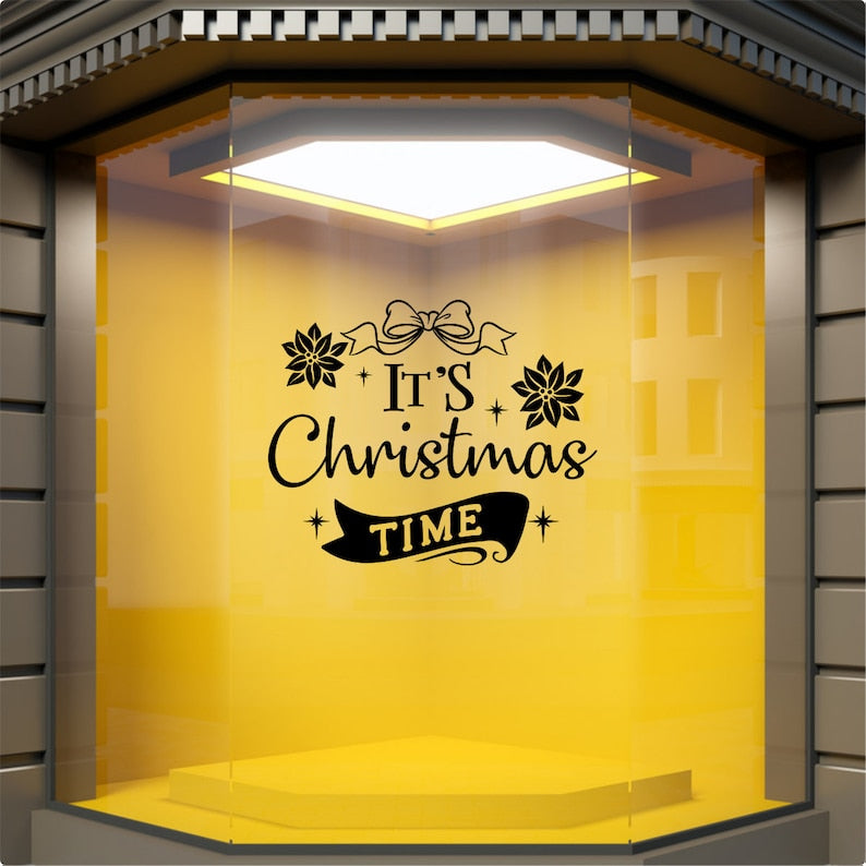 It's Christmas Time festive vinyl decal displayed on a yellow shop window