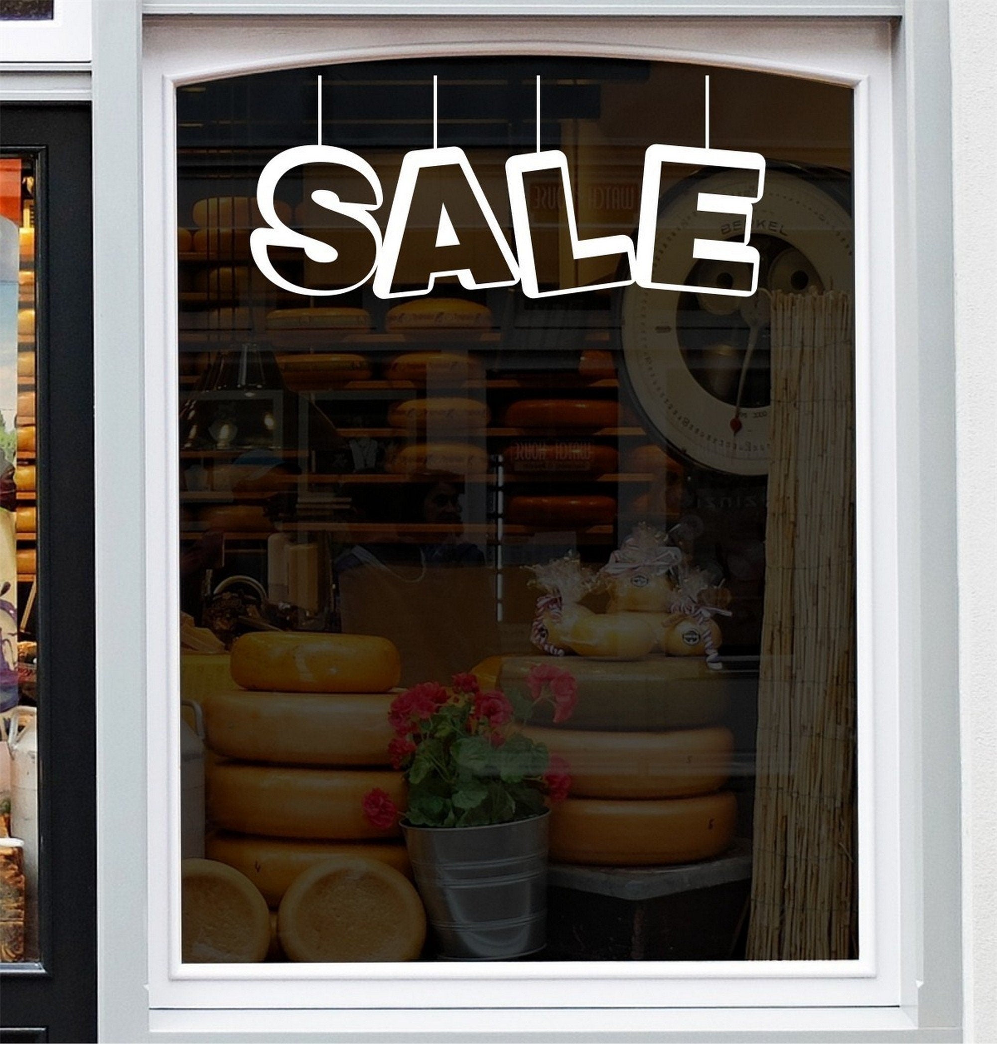Sale Shop Window Sticker for Retail Displays design shown in black on a plain white background