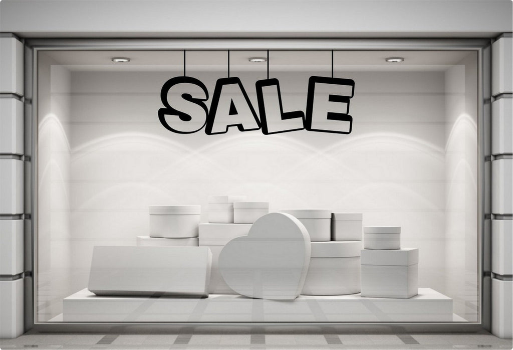 Sale Shop Window Sticker for Retail Displays displayed on a storefront glass pane