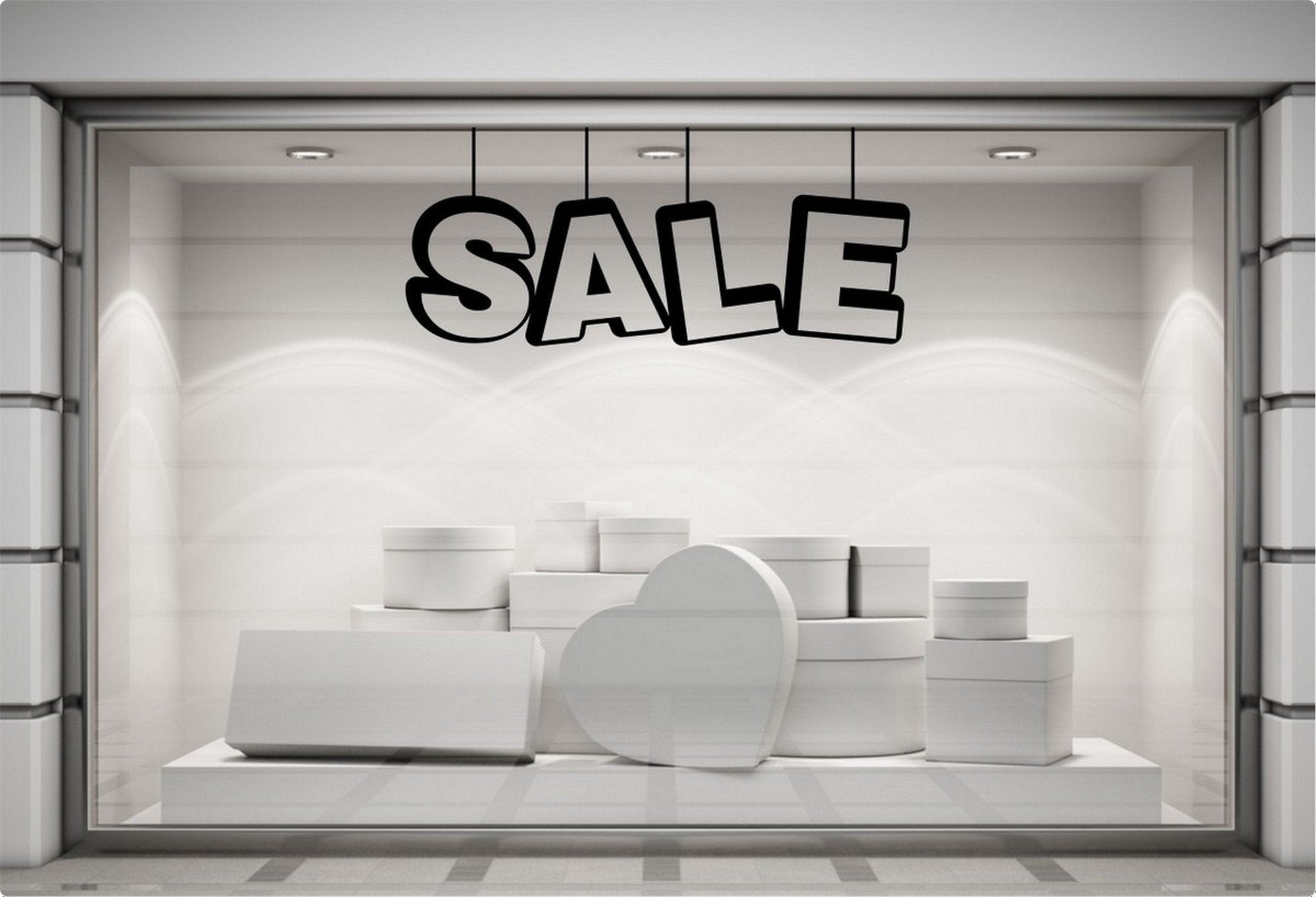Sale Shop Window Sticker for Retail Displays displayed on a storefront glass pane