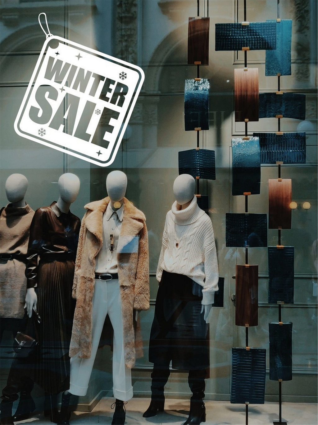 Winter Sale Shop Window Sticker applied to an indoor-facing retail window