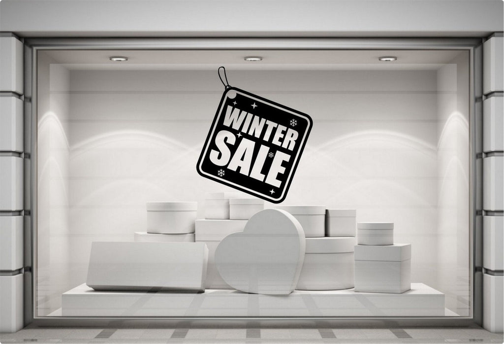 Winter Sale Shop Window Sticker displayed in a seasonal storefront setting