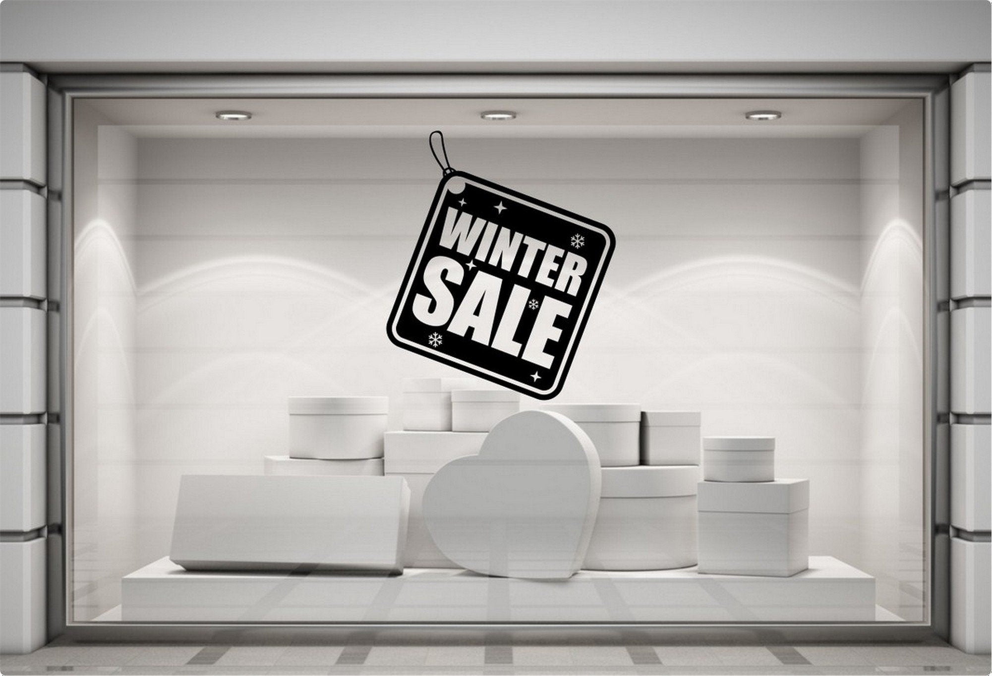 Winter Sale Shop Window Sticker displayed in a seasonal storefront setting