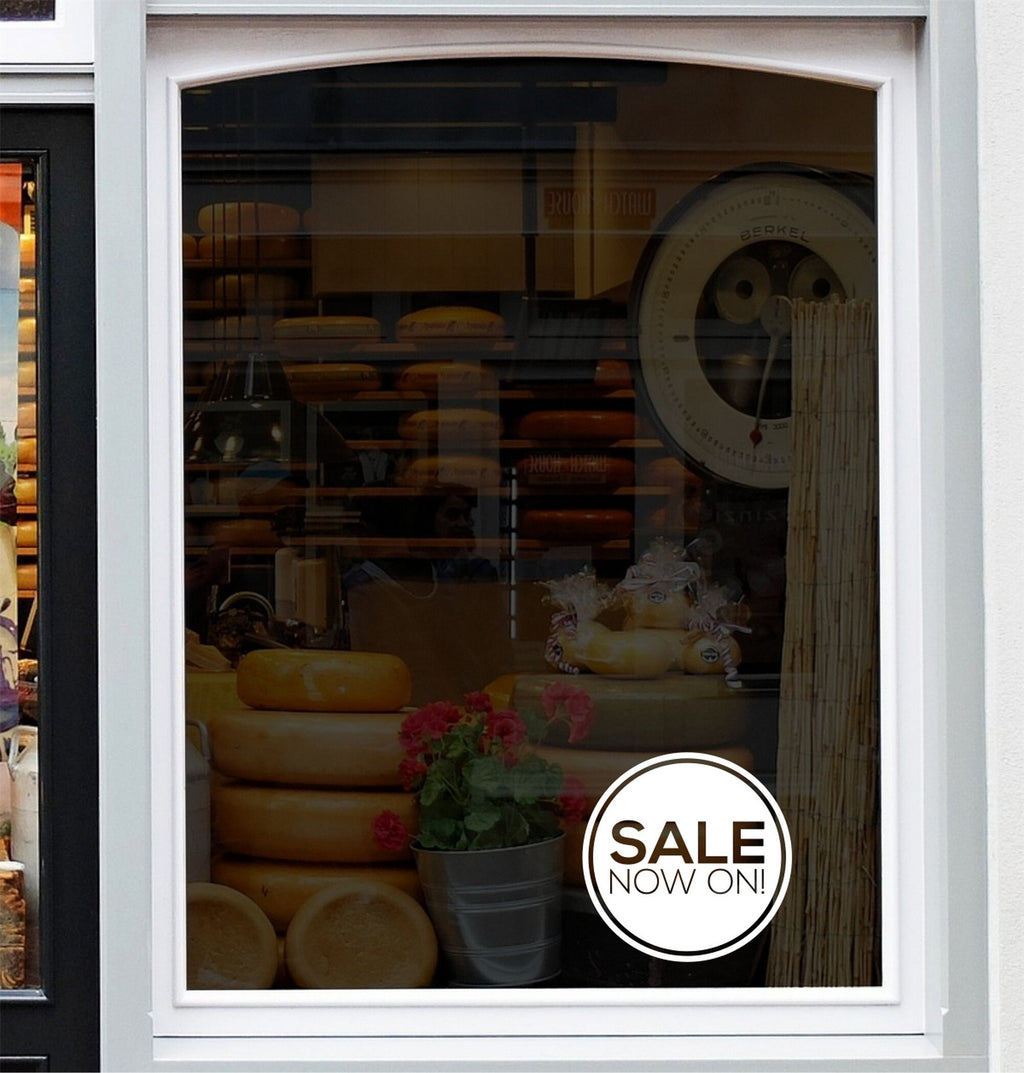 Sale Now On Shop Window Sticker used in a large shopfront display