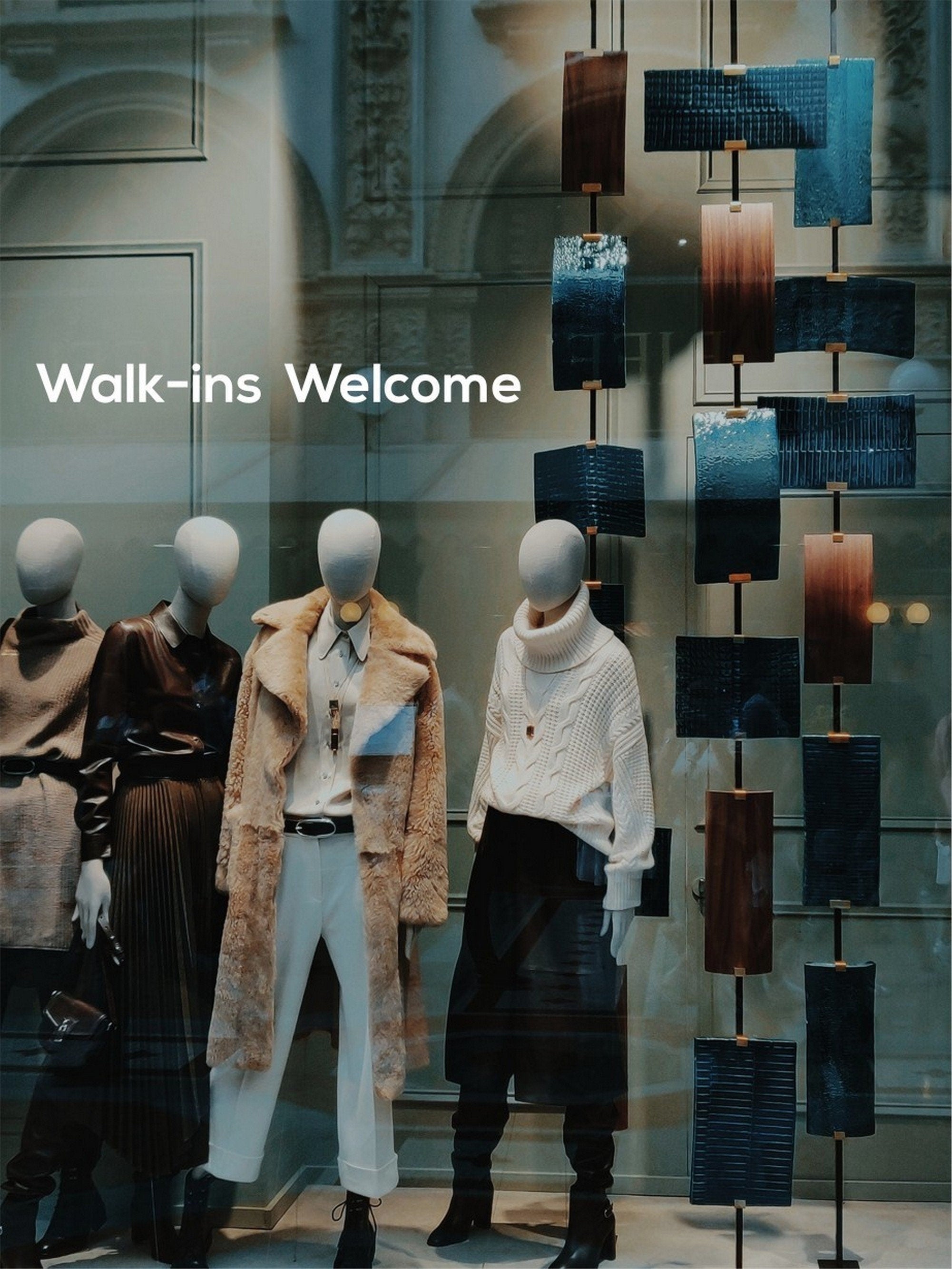 Walk-Ins Welcome Window Sticker for Salons & Barbers shown in an alternative retail window setting
