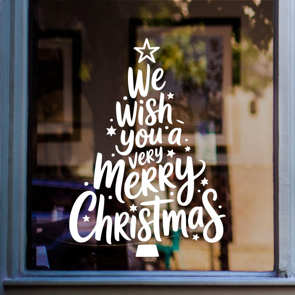 SS302 Christmas tree window sticker in white on a shop window