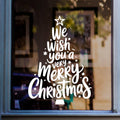 SS302 Christmas tree window sticker in white on a shop window