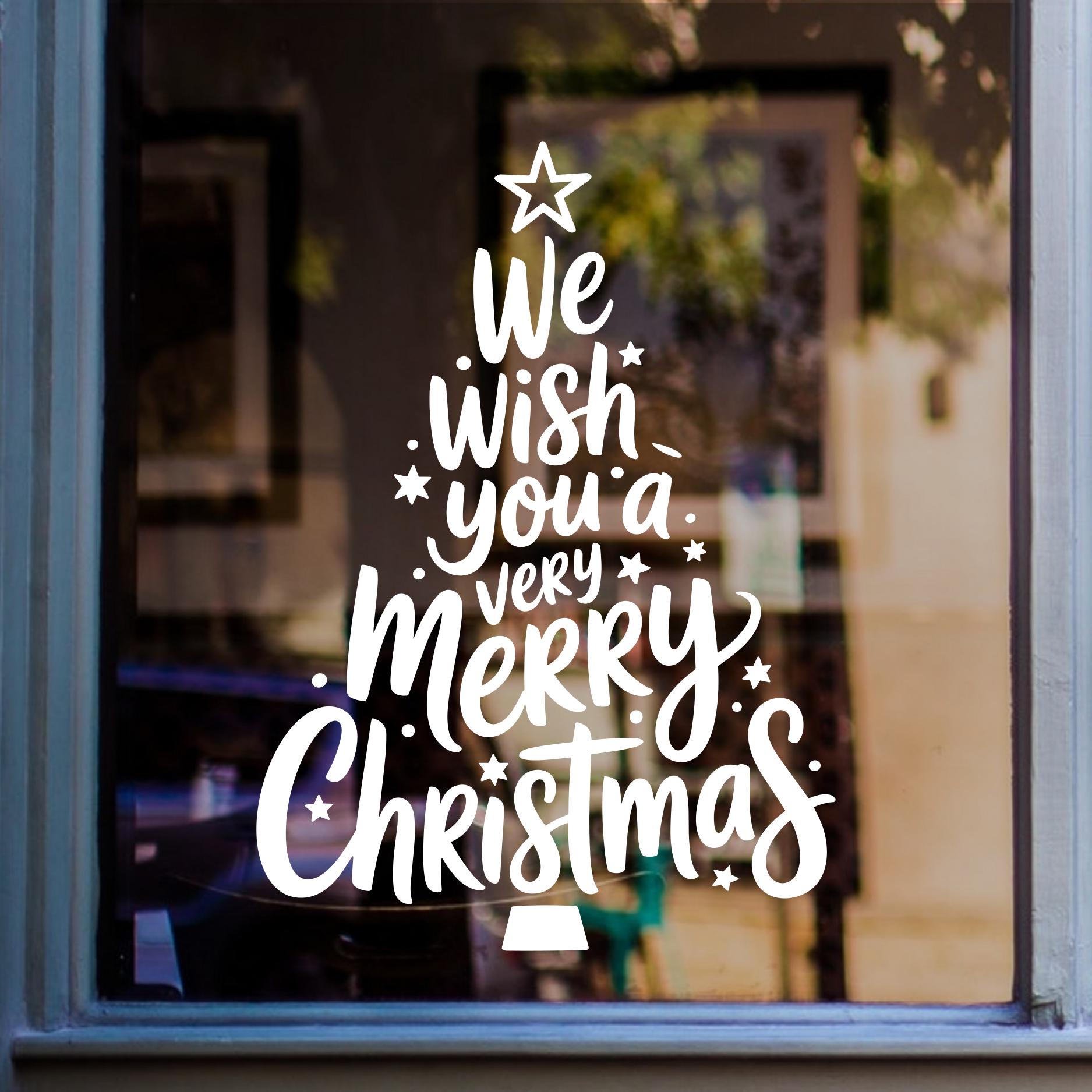 SS302 Christmas tree window sticker in white on a shop window
