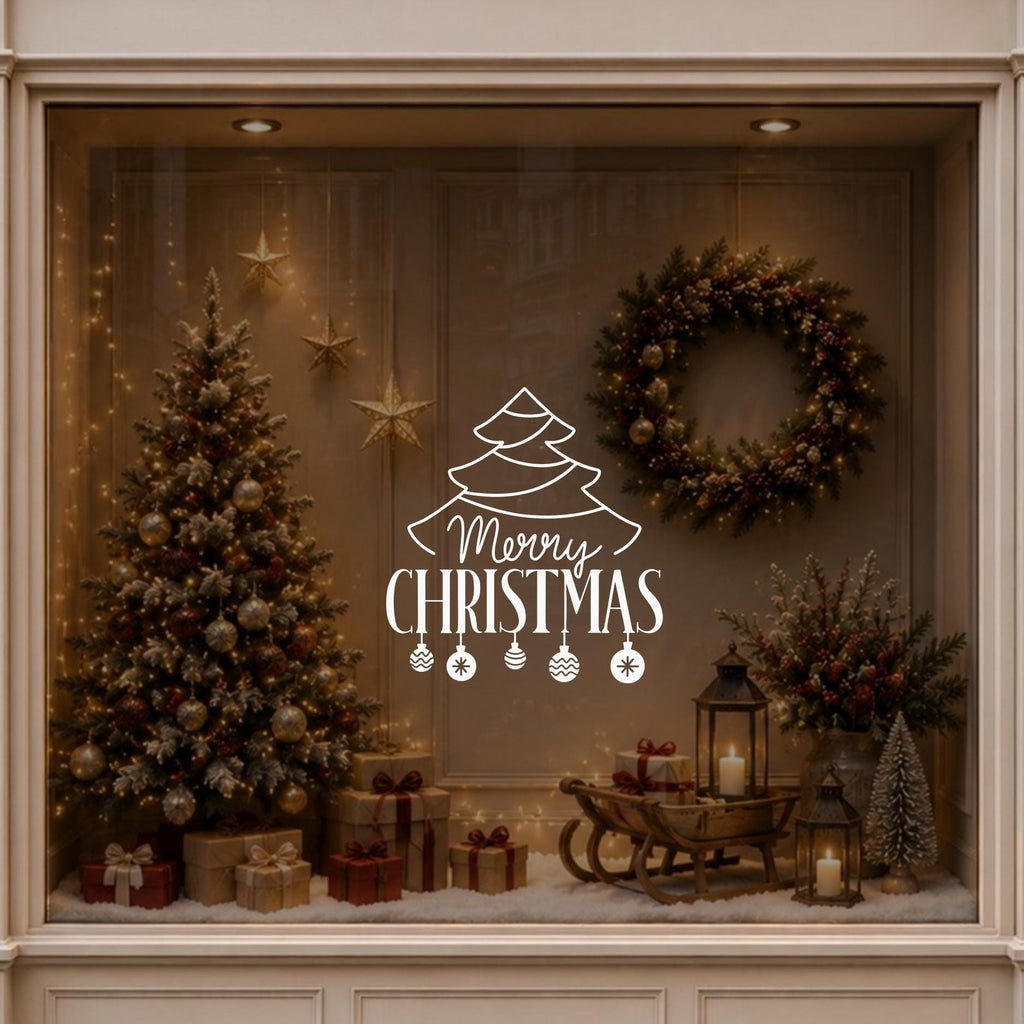 White Merry Christmas tree decal displayed on a festive window