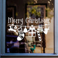 White Merry Christmas window sticker featuring hanging Christmas baubles, presents and festive decorations applied to glass.