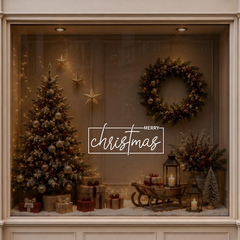 Modern Merry Christmas window decal displayed on glass in a warmly decorated festive interior.