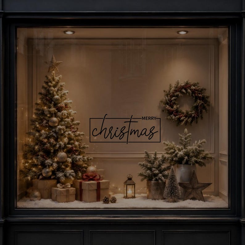 Minimal Merry Christmas vinyl window sticker displayed on dark glass with Christmas decorations in the background.