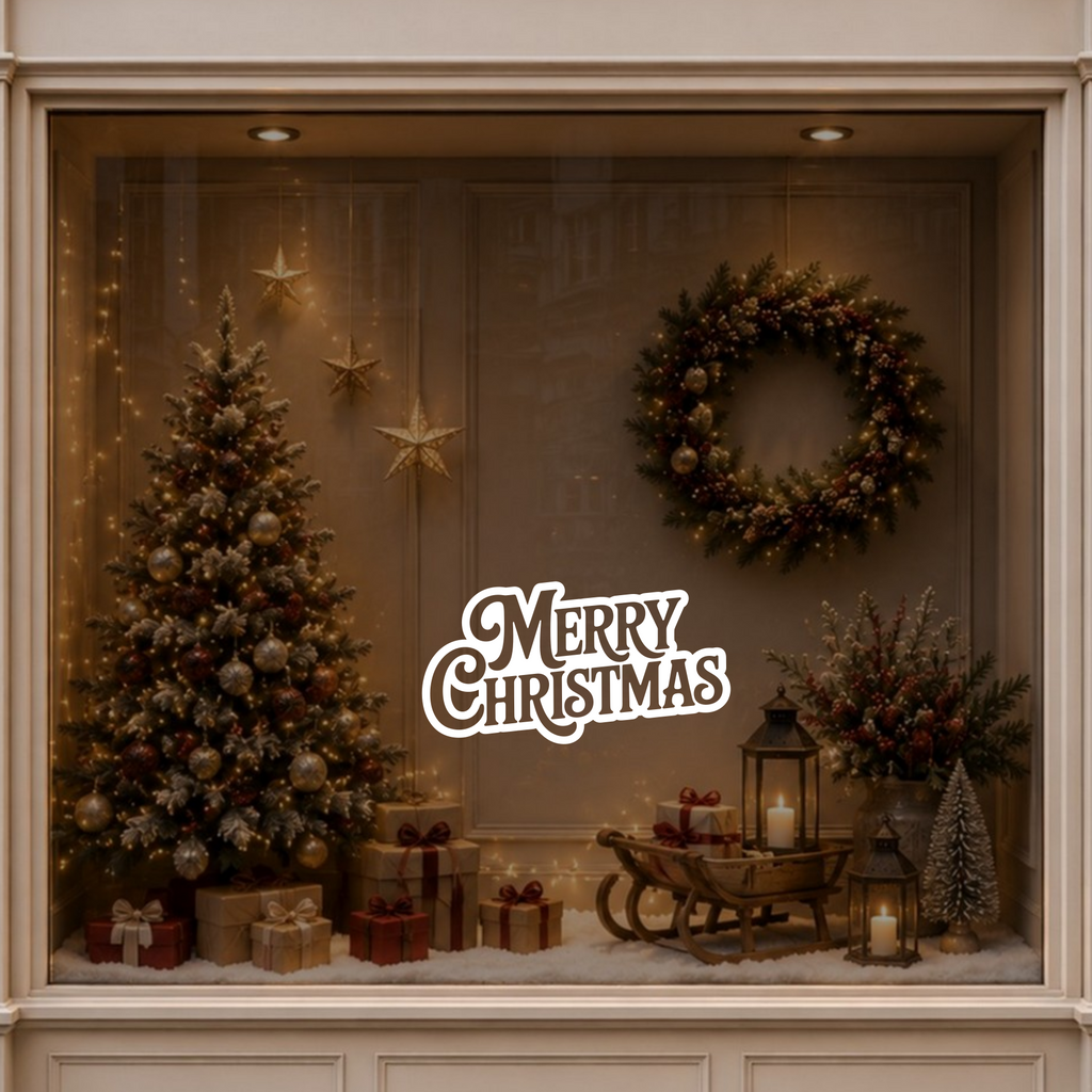 Merry Christmas window sticker displayed in a warm festive interior beside a decorated Christmas tree.