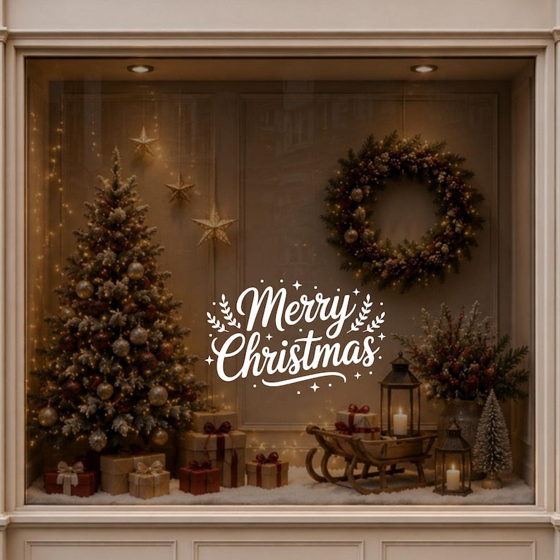 Merry Christmas window decal displayed beside a decorated Christmas tree in a warm festive interior.