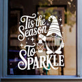 Tis the Season to Sparkle Christmas gnome window sticker displayed in white vinyl on glass.