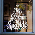 Tis the Season to Sparkle Christmas tree window sticker displayed in white vinyl on glass.