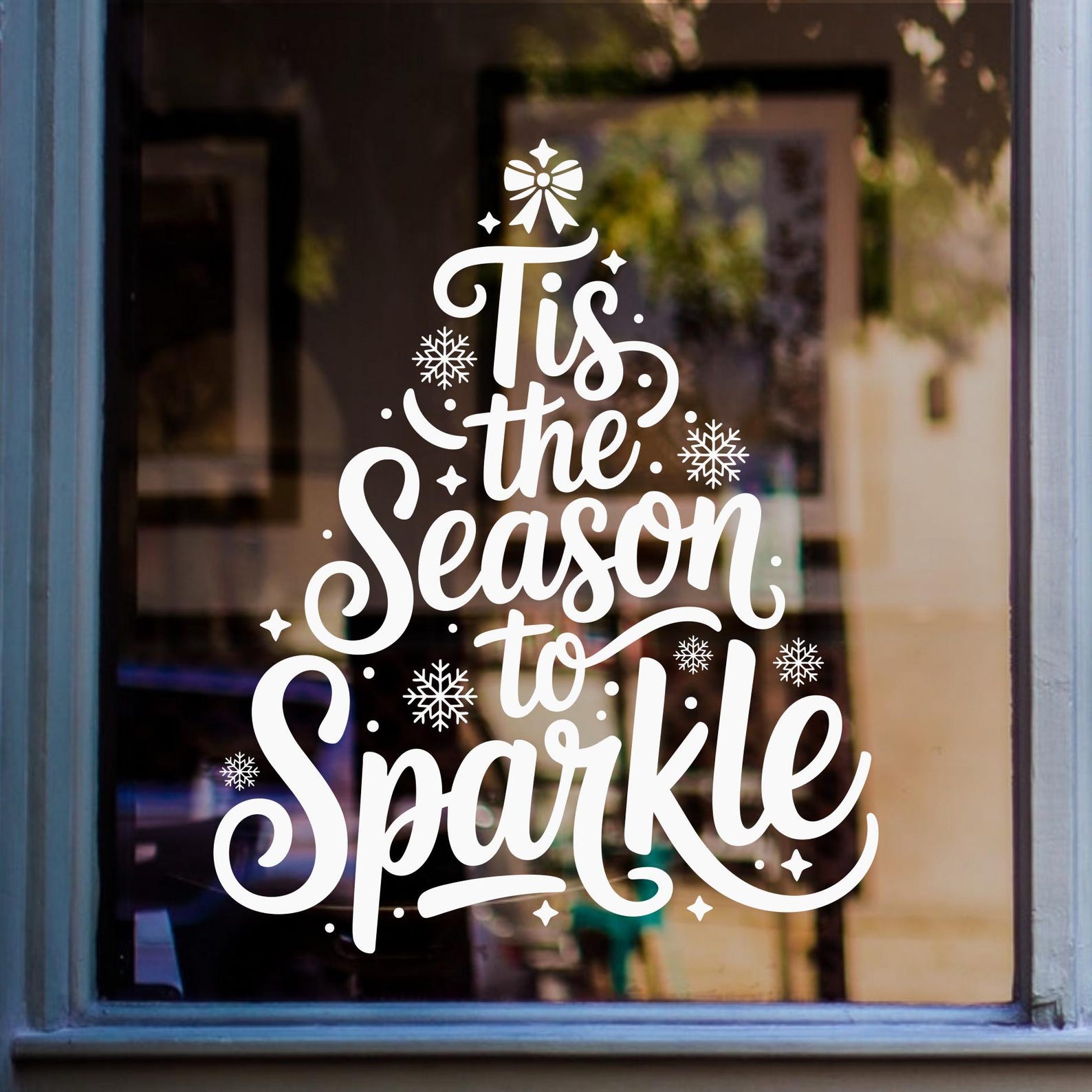 Tis the Season to Sparkle Christmas tree window sticker displayed in white vinyl on glass.
