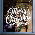 Merry Christmas window sticker featuring bold script lettering and festive stars displayed on glass