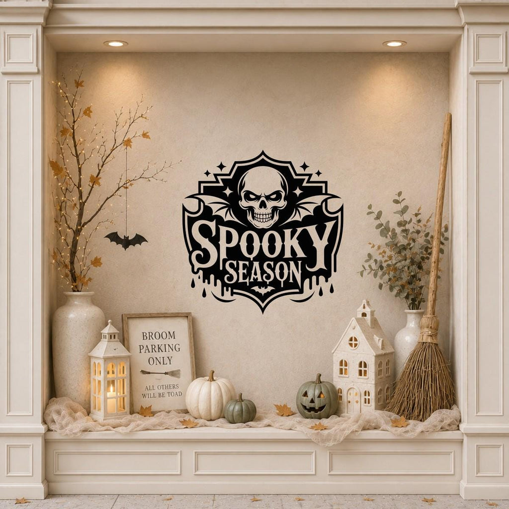 Spooky Season Skull Halloween Window Sticker: black vinyl displayed in a cream shopfront window