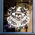 Spooky Vibes Witch Skull & Bat Swarm Window Sticker: white vinyl design on a blue-framed glass door