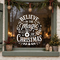 Believe in the Magic of Christmas Window Sticker in white on a sage green framed window decorated for Christmas